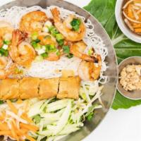 Grilled Shrimp Noodle Salad · Mixed vegetables with white rice noodles. Served with an eggroll.