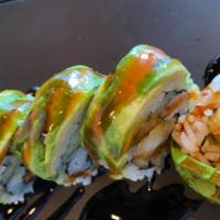 Green Turtle Roll (5) · Shrimp tempura, cucumber eel inside, topped with avocado and eel sauce.