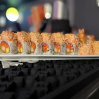 Angry Dragon · Raw. Spicy tuna, shrimp tempura topped w. spicy crab and yuzu miso sauce.