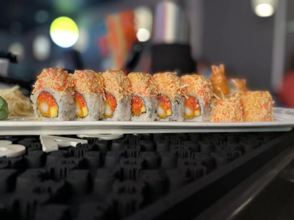 Angry Dragon · Raw. Spicy tuna, shrimp tempura topped w. spicy crab and yuzu miso sauce.
