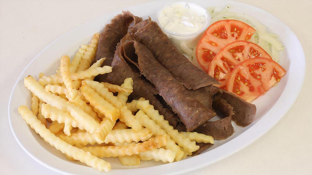 Gyros Plate · Served with onions, tomatoes, sauce, pita bread, fries and soup or salad.