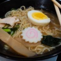 Shoyu Ramen · Tofu, egg, bean sprout, green onion, bamboo, sliced onion, cooked in a spicy soy sauce based...