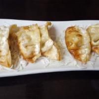 Gyoza · Deep fried dumplings.