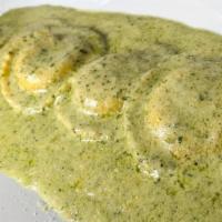 Mushroom Or Cheese Ravioli · Your choice between tender, fresh mushroom filled ravioli topped with our creamy house-made ...