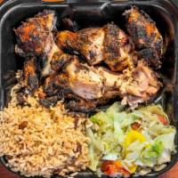 Jerk Chicken · Served with rice, peas, plantain, and mixed vegetables.