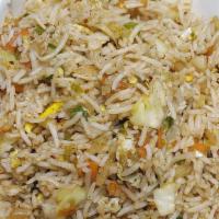 Egg Fried Rice · Aromatic long grain basmati rice cooked with eggs, vegetables, Herbs and spices.