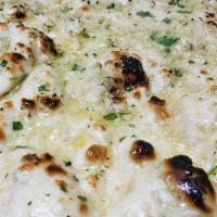Garlic Naan · Topped with chopped fresh garlic and coriander.