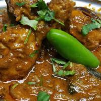 Malabar Chicken Curry & Rice [Gf] · Boneless chicken cooked with coconut milk, herbs & spices.