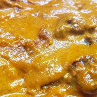Goat Tikka Masala & Rice [Gf] · Goat in the classic creamy tikka masala sauce, herbs & spices.