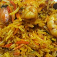 Shrimp Biriyani  [ Gf ] · Spiced basmathi rice cooked with shrimp biriyani masala. Comes with Raita and pickle.
