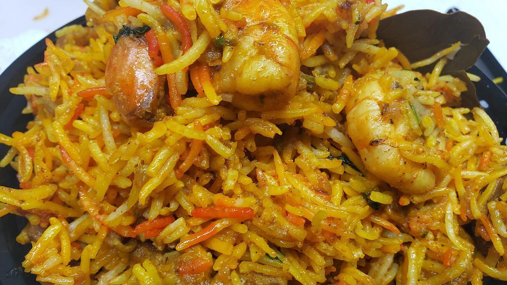 Shrimp Biriyani  [ Gf ] · Spiced basmathi rice cooked with shrimp biriyani masala. Comes with Raita and pickle.