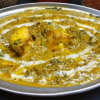 Saag Paneer &  Rice  [ Gf ] · Chunks Paneer cooked in a creamy spinach sauce with rich herbs and spices.