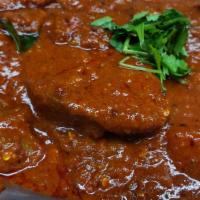 Veg Vindaloo (Spicy) & Rice [ V & Gf ] · Mixed vegetable, onion, tomato, chef special vindaloo sauce, herbs & spices.  [V- vegan can ...