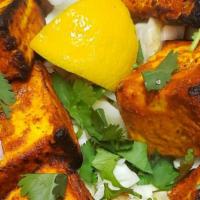 Paneer Tikka · Paneer marinated with indian spices and grilled in a special Indian clay oven.