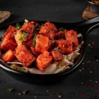Paneer '65' · Deep-fried paneer cubes battered & tossed with curry leaves, cumin seeds, green chili, and h...
