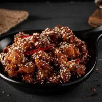 Sesame Chicken · Boneless chicken pieces flash-fried and tossed in special sweet & spicy sauce made with brow...