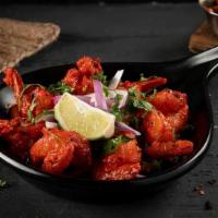 Shrimp 65 · Jumbo shrimp marinated and tossed with curry leaves, cumin seeds, green chili, and special S...