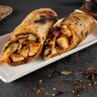 Butter Paneer Kati Roll · Paneer cheese cubes cooked in light butter sauce & wrapped with tandoori vegetables & chutne...