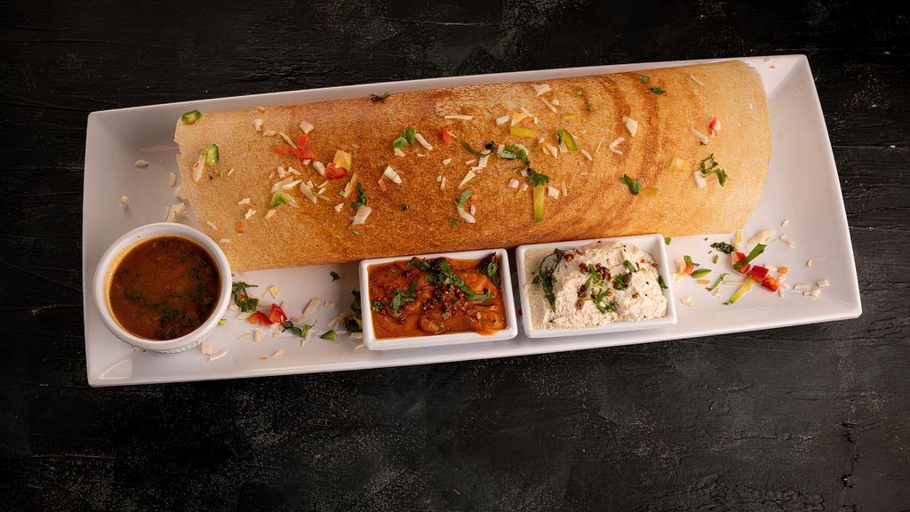 Masala (Potato) Dosa · Traditional rolled south Indian 'crepe' filled with special potato masala; served with sambar & special chutneys
