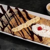 Banana Nutella Dosa · Delicate folded south Indian breakfast 'crepe' filled with special Nutella (hazelnut) sauce ...