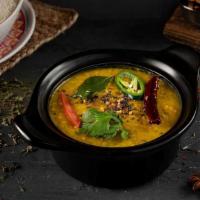 Paradise Dal Tadka · Hearty dal stew made from masoor & moong dal (red & yellow lentil),  turmeric, sautéed onion...