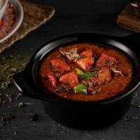 Chicken Tikka Masala · Chicken tikka breast pieces cooked with onion, ginger, red & green bell pepper in creamy tom...