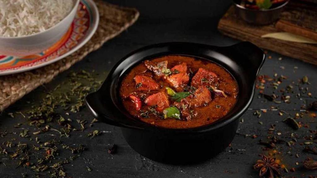 Chicken Tikka Masala · Chicken tikka breast pieces cooked with onion, ginger, red & green bell pepper in creamy tomato-butter sauce