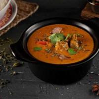 Lamb Tikka Masala · Boneless lamb pieces cooked until tender with bell pepper, ginger-garlic paste, red & yellow...