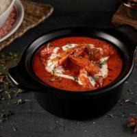 Butter Shrimp · Large tender shrimp cooked in creamy tomato-butter sauce, flavored with fenugreek and specia...