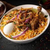 Chicken Dum Biryani · Unique traditional-layered rice dish cooked with bone-in chicken, Basmati rice, and exotic s...