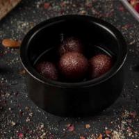 (4) Gulab Jamuns · Popular spongy milk donut balls soaked in warm rose cardamom scented syrup, topped with fres...