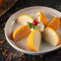 Orange Kulfi · Special traditional 'ice cream' made by slowly condensing whole milk flavored with cardamom,...