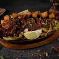 Whole Tandoori Snapper · Whole Red Snapper marinated in special masala, slowly roasted and pan-fried to crisp with ro...