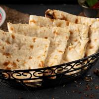 Paneer Kulcha · Fresh home-made white bread stuffed with minced paneer cheese in clay oven