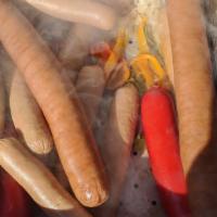 Hot Dog · Regular hot dog with ketchup mustard relish.