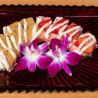 Yummy Roll · Banana tempura topped with kiwi strawberry (love sauce).