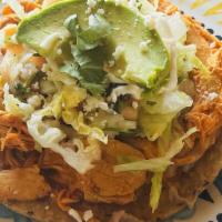 Tostadas · A crispy fried tortilla with your choice of meat, beans, lettuce, queso fresco, sour cream, ...