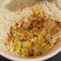 Mexican Corn In A Cup · Elotes (Mexican corn in a cup) topped with butter, mayo, cotija cheese, and chili powder.