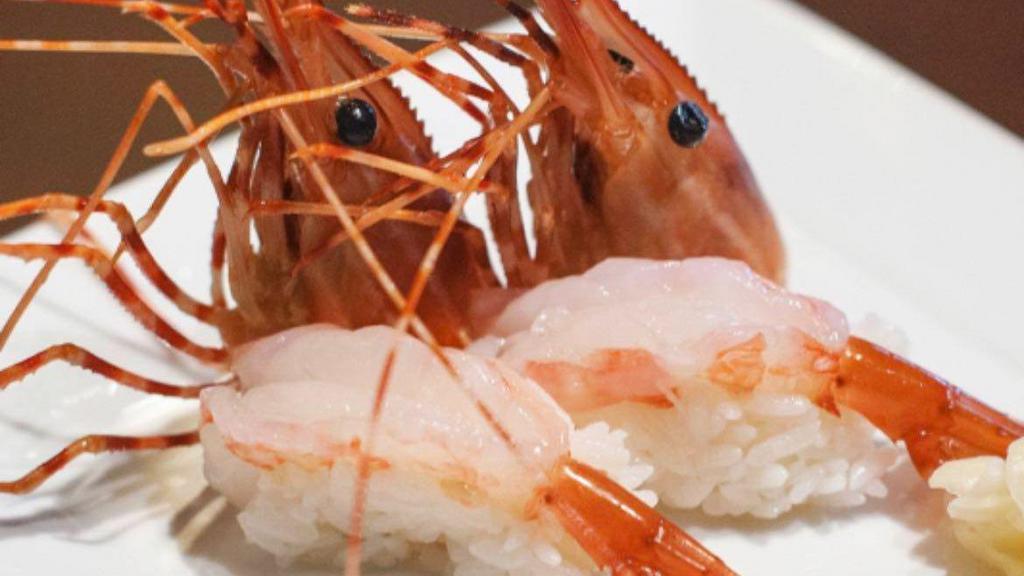 Jumbo Sweet Shrimp (2) · Raw fish. two pieces.