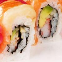 Rainbow Roll · Crab stick, cucumber and avocado topped with an assortment of fish. Raw fish.