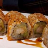 Crunch Roll (8) · Shrimp tempura, cucumber, tempura crumb and masago and finished with sweet eel sauce and spi...