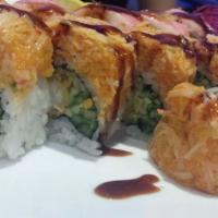 Mj Roll (8) · Shrimp tempura and cucumber topped with spicy snow crab and sweet eel sauce.