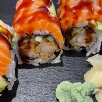 9 Roll (8) · Shrimp tempura, cucumber topped with salmon, avocado and sweet eel
sauce.