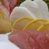 Sashimi Entree · 15 piece assorted raw fish and a bowl of sushi rice.