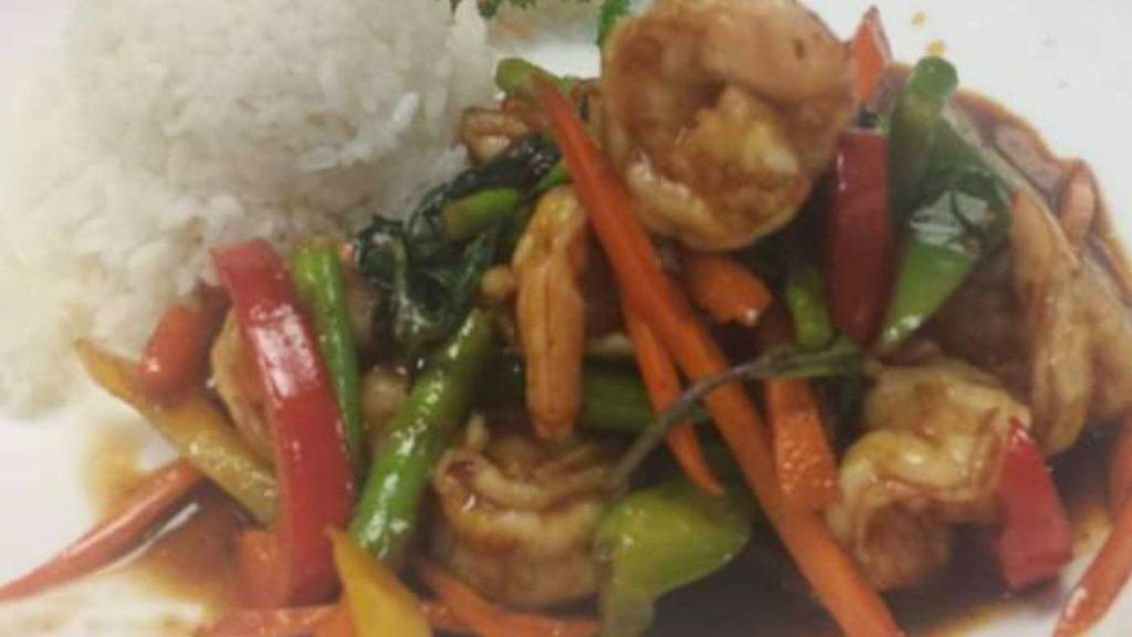 Basil Jumbo Shrimp · Stir-fried with carrots, basil, sprouts, onions and bell peppers in Thai sauce. Spicy. Choose soup or salad.