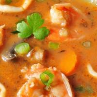 Seafood Soup · Delicious authentic Spanish seafood soup of mussels, calamari, shrimp, and salmon made fresh...