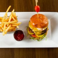 Triple Blend Burger · Double patty burger, lettuce, tomato, onion, pickles, remoulade, American cheese, and brioch...