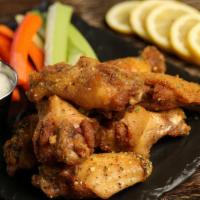 Traditional Lemon Pepper · 8 lemon pepper wings, served with carrots & celery and a choice of blue cheese or ranch for ...