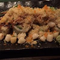 Rock & Roll · shrimp tempura, cucumber and avocado inside, topped with baked baby scallops, finished with ...