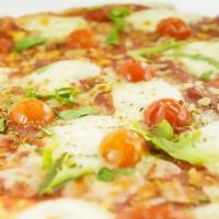 North East Margherita · Sliced fresh tomatoes, fresh basil, roasted garlic topped with mozzarella cheese. Served wit...